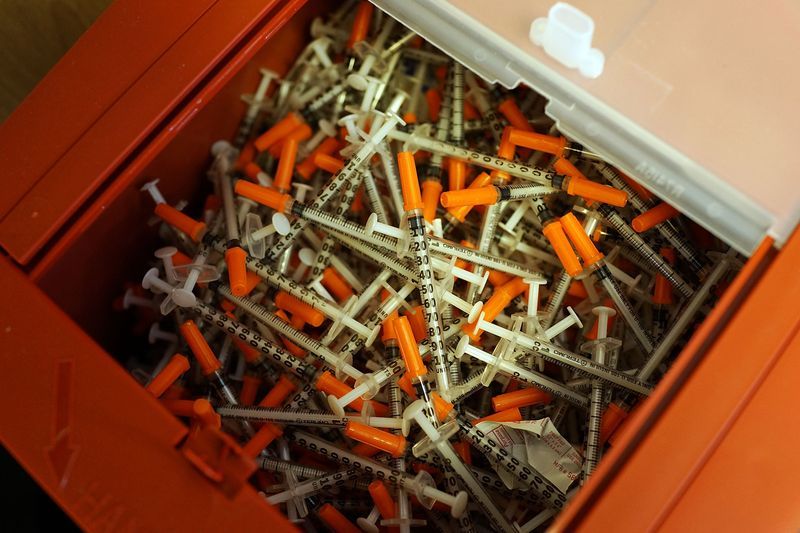 A box of syringes.